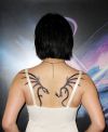 tribal dragon on girl's back